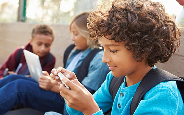 Children using mobile phones